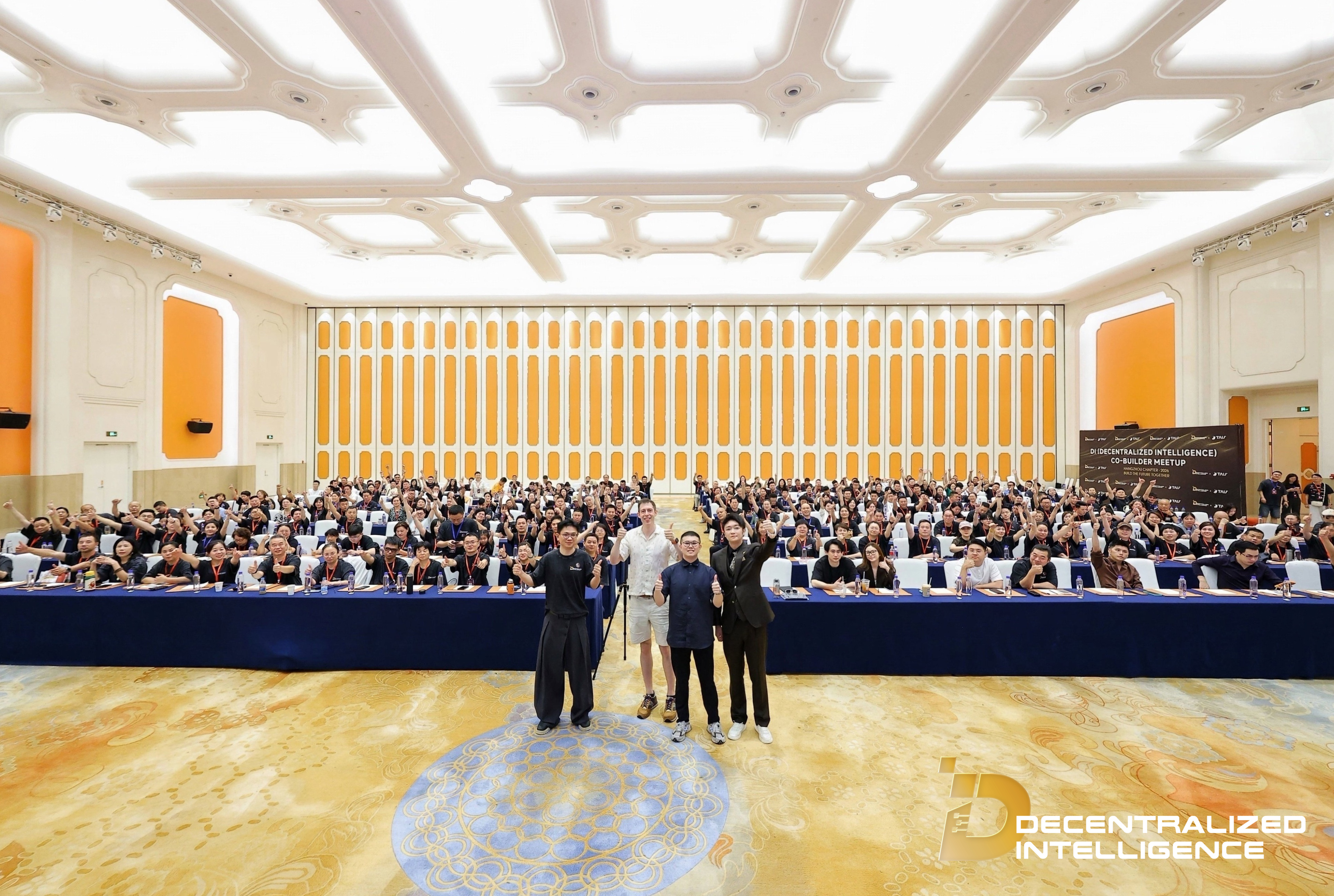 A wide group portrait of the DI Co-Builder Meetup community.